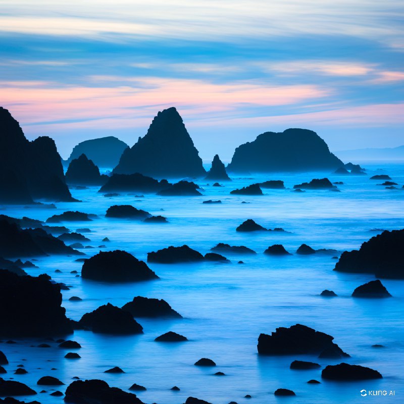 #Bing_WallpaperA mesmerizing coastal scene at twilight in Sonoma Coast State Park, California. The rugged shoreline is adorned with jagged, dark rock formations emerging from the serene ocean, creating a dramatic silhouette against the soft glow of dusk. The sky is a canvas of gentle blues and purples, with wisps of clouds painted in subtle shades of peach and pink, hinting at the day's end. The ocean is calm yet vibrant, with a misty haze enveloping the scene, adding depth and mystery. The overall composition captures the tranquil yet majestic essence of the tidal landscape, evoking a sense of peace and wonder. The image is rich in color and texture, embodying an impressionistic, almost ethereal style that highlights the natural beauty and dynamic interplay of light and shadow.加州索诺马海岸州立公园黄昏时分迷人的海岸景象